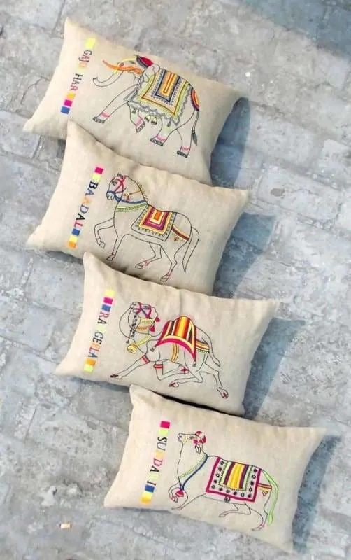 Linen pillow cover decorated with embroidered horse