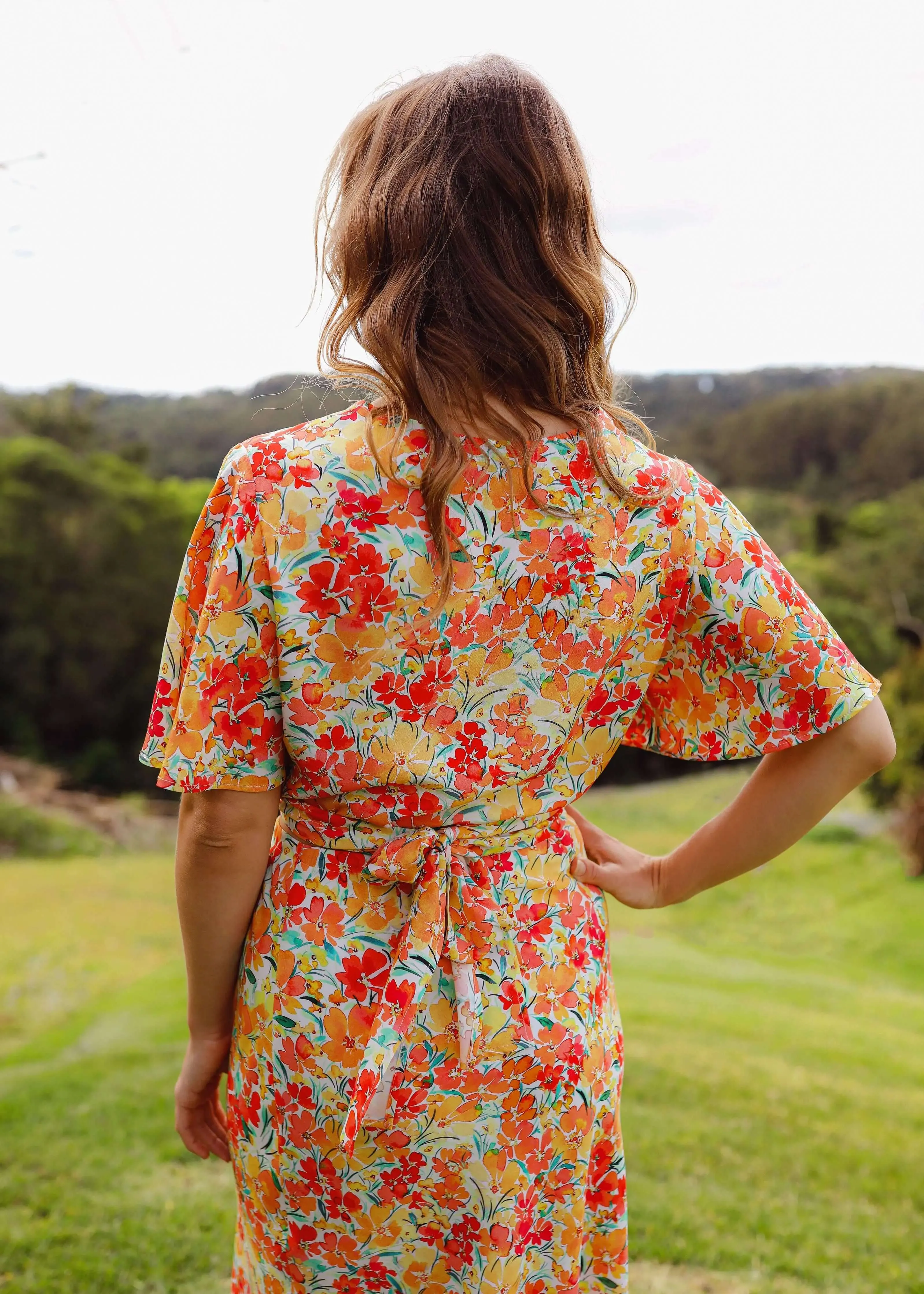 The Flora Wrap Blouse Bloom by Tasi Travels