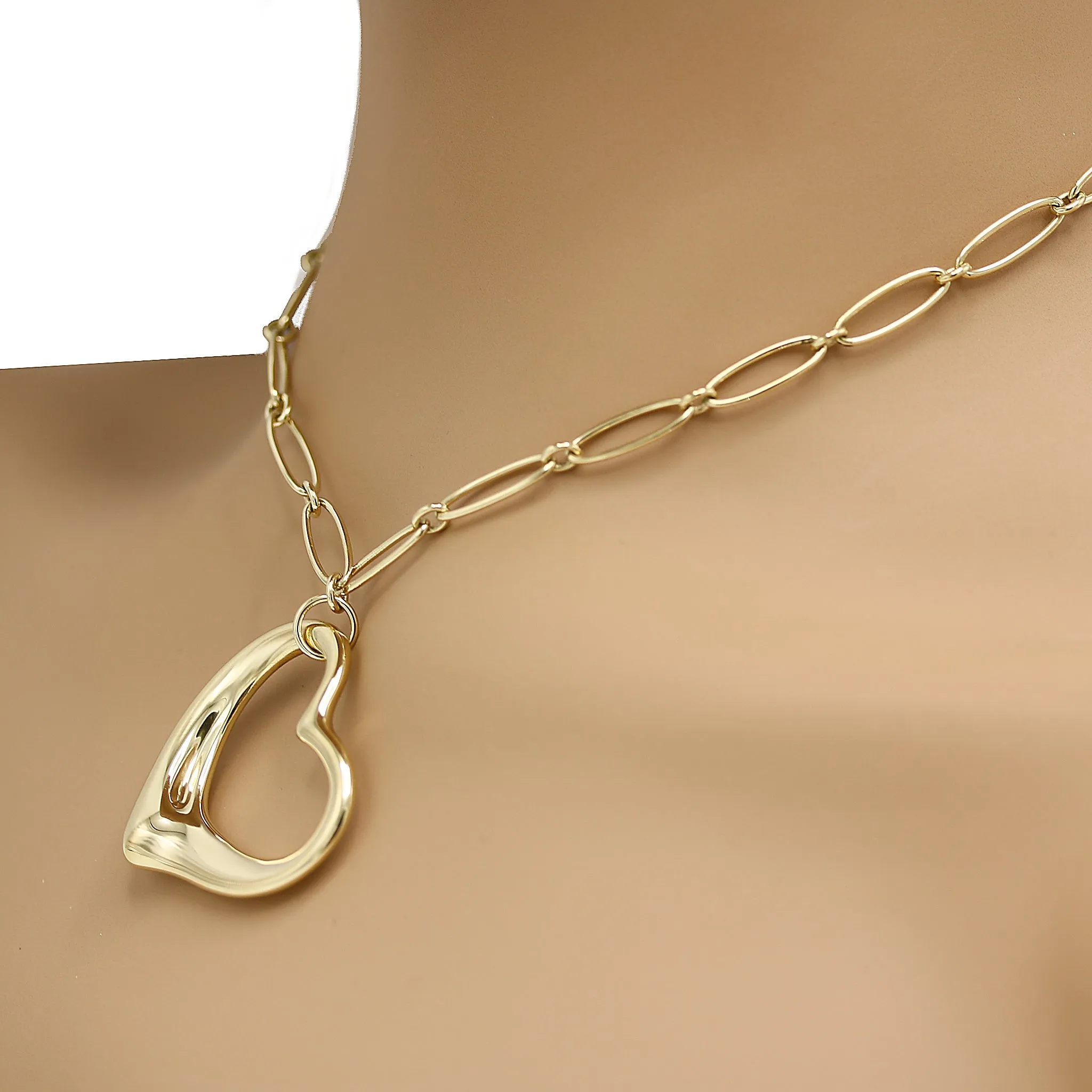 Tiffany and Co. Elsa Peretti Open Heart Pendant with Link Chain Necklace